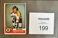 Front of 1974-75 O-Pee-Chee Bobby Orr card showing creases and corner wear