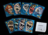 Fronts of all nine Pinnacle Mask insert cards showing mask artwork