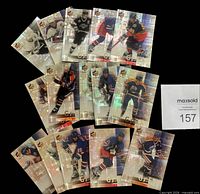 Fronts of all 15 holographic cards fanned out