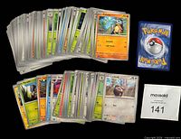 Two stacks of Pokémon cards, front card Cubone visible