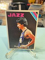 Front view of Pete Maravich Topps card showing image and JAZZ header
