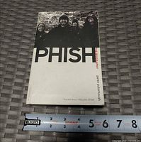 Front cover showing title, author, band photo, measures approx 8 x 5.5 in