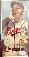 Full view of signed Billy Southworth newspaper clipping with Braves image and blue autograph