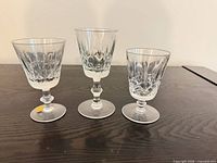 Three representative lead crystal stemware pieces showing sizes and pattern