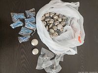 bulk bag of brushed stainless steel knobs with separate packs of screws