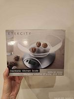 Front of sealed box displaying Etekcity EK3550 scale