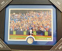 Framed print with coin and edition info visible