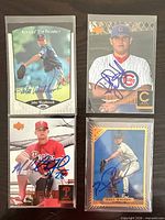 All four autographed rookie cards laid out