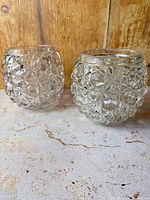 Two crystal rose bowls front view showing pattern