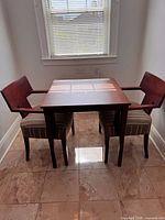 table and two chairs front view