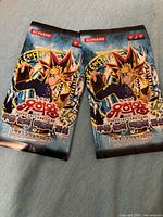 Front view of both sealed booster packs showing artwork and Korean text