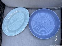 Top view of both serving pieces showing colors and ripple texture
