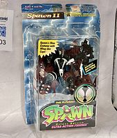 Front view of sealed Spawn II figure on blister card