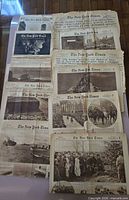 Stacked view of multiple 1919 New York Times Picture Section inserts showing front pages