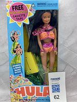 Front view of boxed Island Princess hula doll and included cassette tape