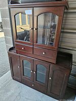 Full view of china cabinet showing upper glass hutch and lower buffet