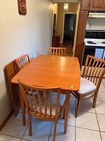 dining table with four matching chairs overall view