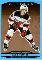 Front of Jack Hughes Gold Rainbow card showing player in Devils uniform