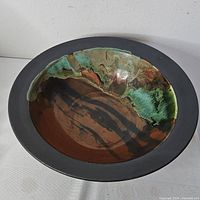 Top view showing interior glaze pattern and rim