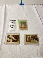 Overall view showing all three Ted Williams cards in plastic sleeves