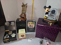 Group shot showing all listed Disney Haunted Mansion and Nightmare Before Christmas collectible items with their packaging