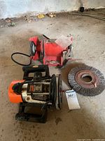Router, grinder, spare wheel group shot