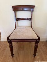 Full front view of mahogany inlaid dining chair