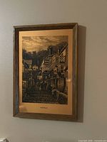 Close-up of framed Clovelly etched copper picture