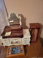 All four jewelry storage pieces grouped together