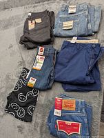 Overview of all six pairs of boys jeans and shorts laid out