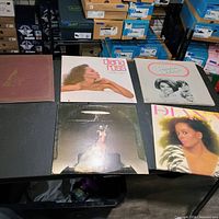 Five album jackets displayed