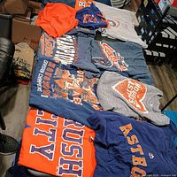 Assorted Astros apparel spread on table