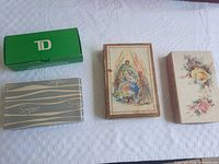 Four vintage cardboard boxes displayed side by side