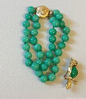 Bracelet folded and brooch side by side