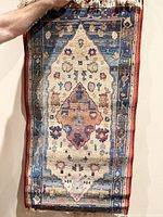 Full view of rug front showing pattern, colors, overall condition