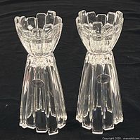 Front view of both crystal candlesticks showing overall design, height, and matching form
