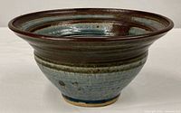 Side profile showing glaze colours and form