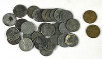 Full group of 28 steel cents and 2 copper cents on white cloth