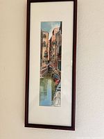 Full view of framed print on wall