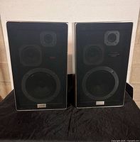 Front view of both Toshiba SS-407W speakers with grilles on
