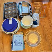 Group shot of all bakeware, bowls, containers and cookbooks
