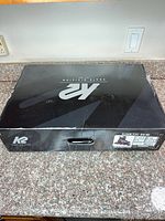 Closed K2 retail box showing branding