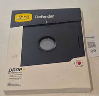 Front of boxed OtterBox Defender case