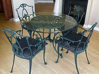 Full set showing table and four chairs