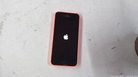 Front of iPhone 5c showing Apple boot logo