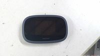 Front view showing Verizon logo and display screen