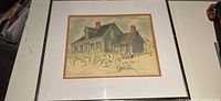 Full view of framed cottage painting with mat and frame