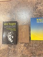 Front covers of three items: Respect for Acting hardcover, My Trip journal, Write to Win paperback