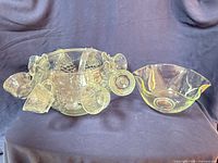 punch bowl with attached cups and separate scalloped bowl
