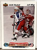 Front of Keith Tkachuk Upper Deck rookie card showing action image and World Junior Tournament design